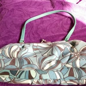 clip top satin-lined evening bag